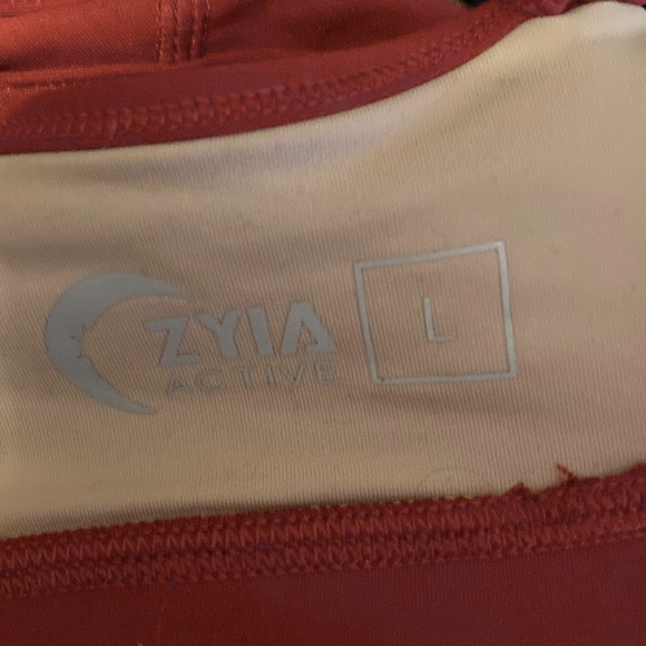 Game Day Light and Tight Sports Bra.Size Large, color is more burgundy than red. - Picture 5 of 5